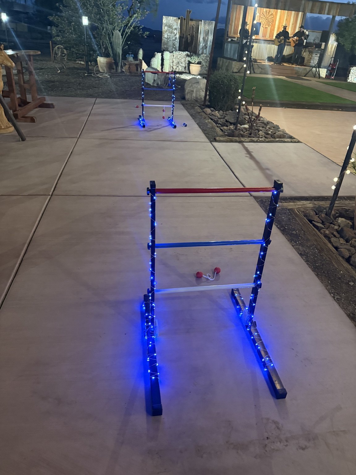 Ladderball set with blue lights at an outdoor event